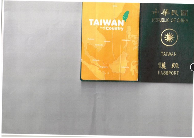 Recusada entrada a mulher com etiqueta sobre Taiwan no passaporte 