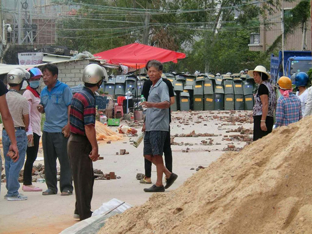 China |Autoridades detêm manifestantes em aldeia com experiência democrática