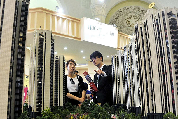 China tenta acabar com ‘ponzi’ imobiliário em transição para novo modelo económico