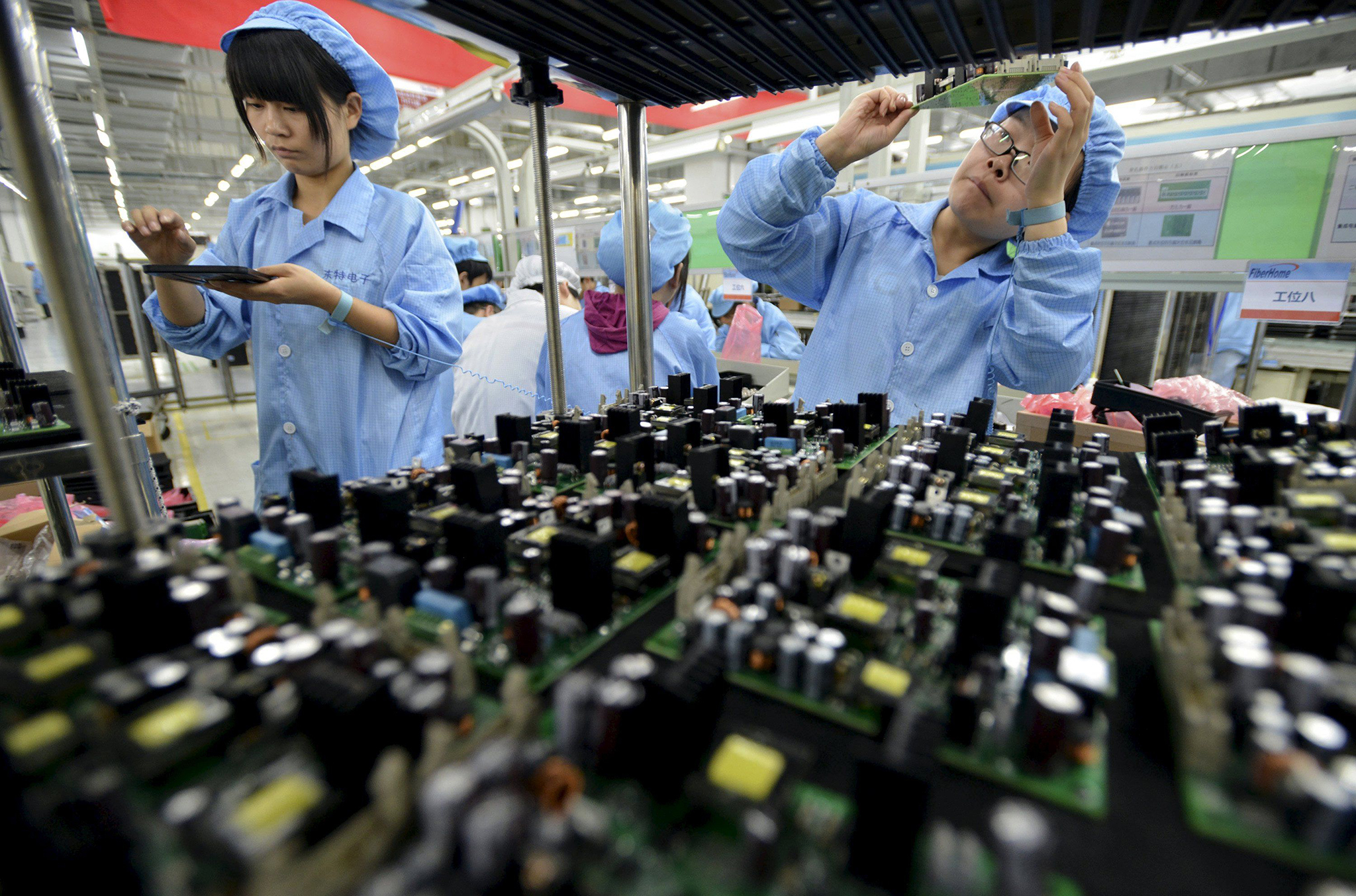 China | Actividade industrial sobe ao ritmo mais rápido desde 2013