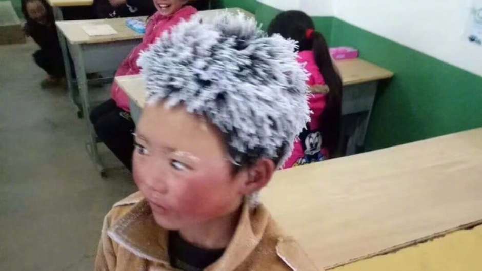 China | “Menino de gelo” gera debate sobre pobreza