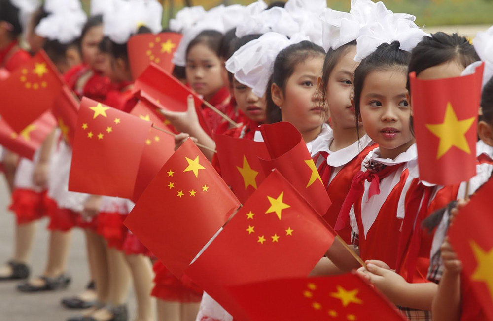 Ano Novo | MNE chinês destaca aperfeiçoamento da “defesa da segurança nacional”